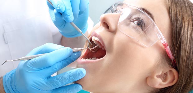 Dental patient being examined